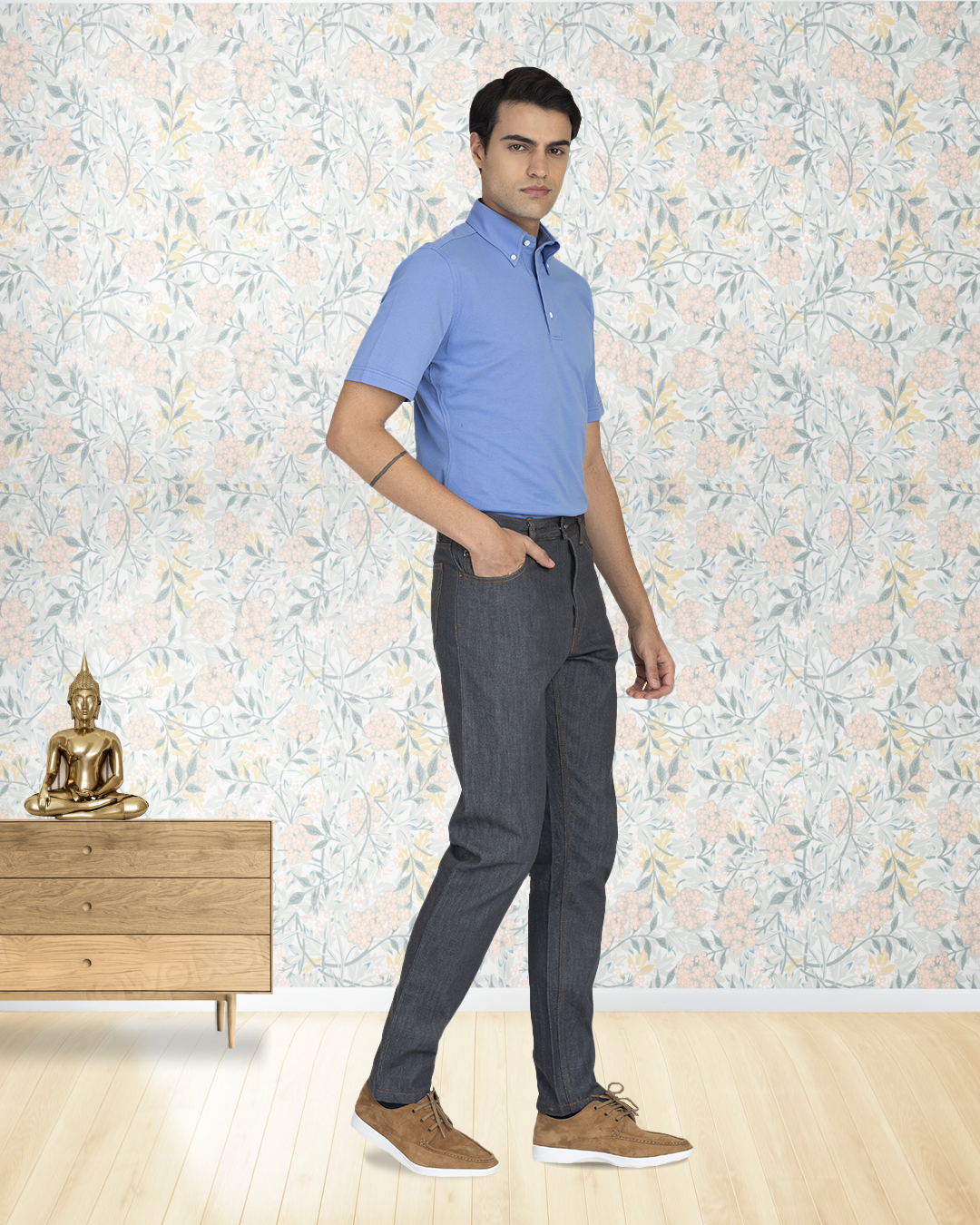 Model wearing custom jeans for men by Luxire in grey