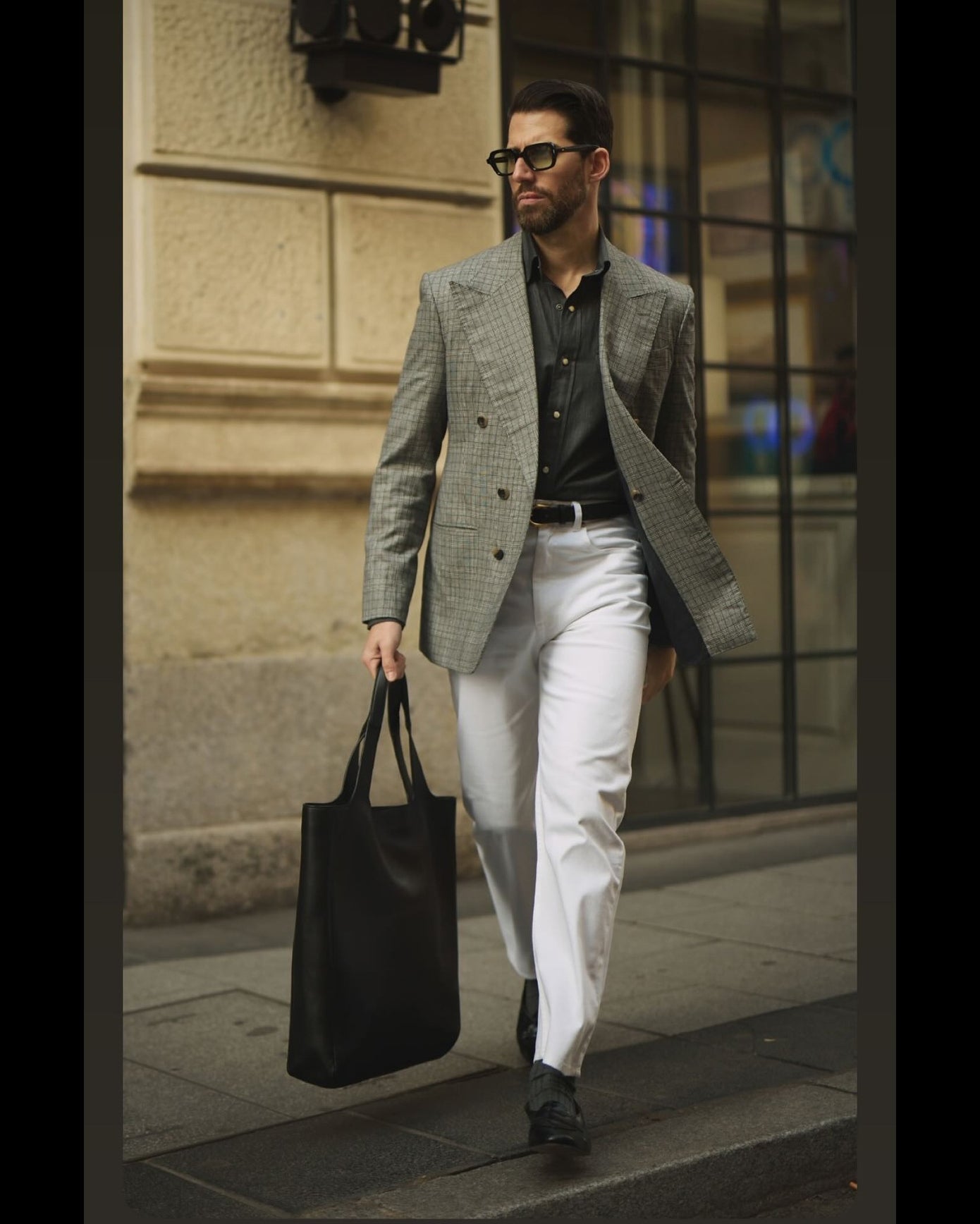 Model outside wearing mens heavy twill jeans by Luxire in white 5