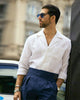 Male model wearing custom linen Gurkha pants for men by Luxire in dark indigo with hand in pocket