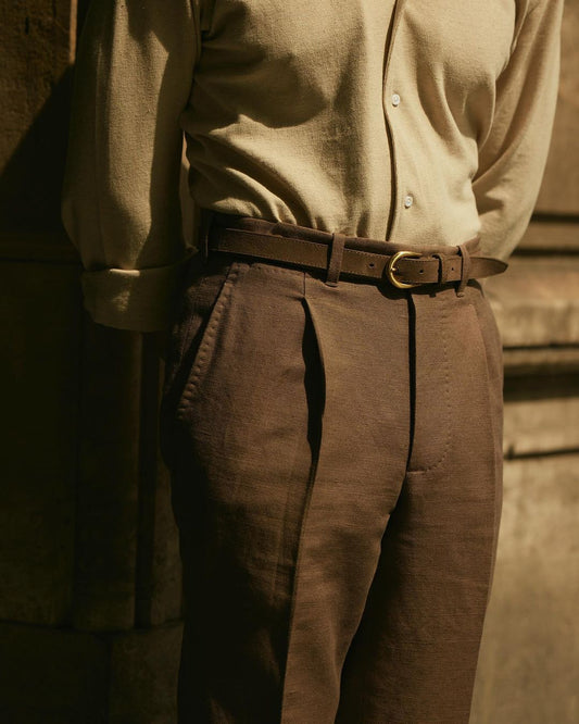 Front view of custom linen canvas pleated pants for men by Luxire in brown