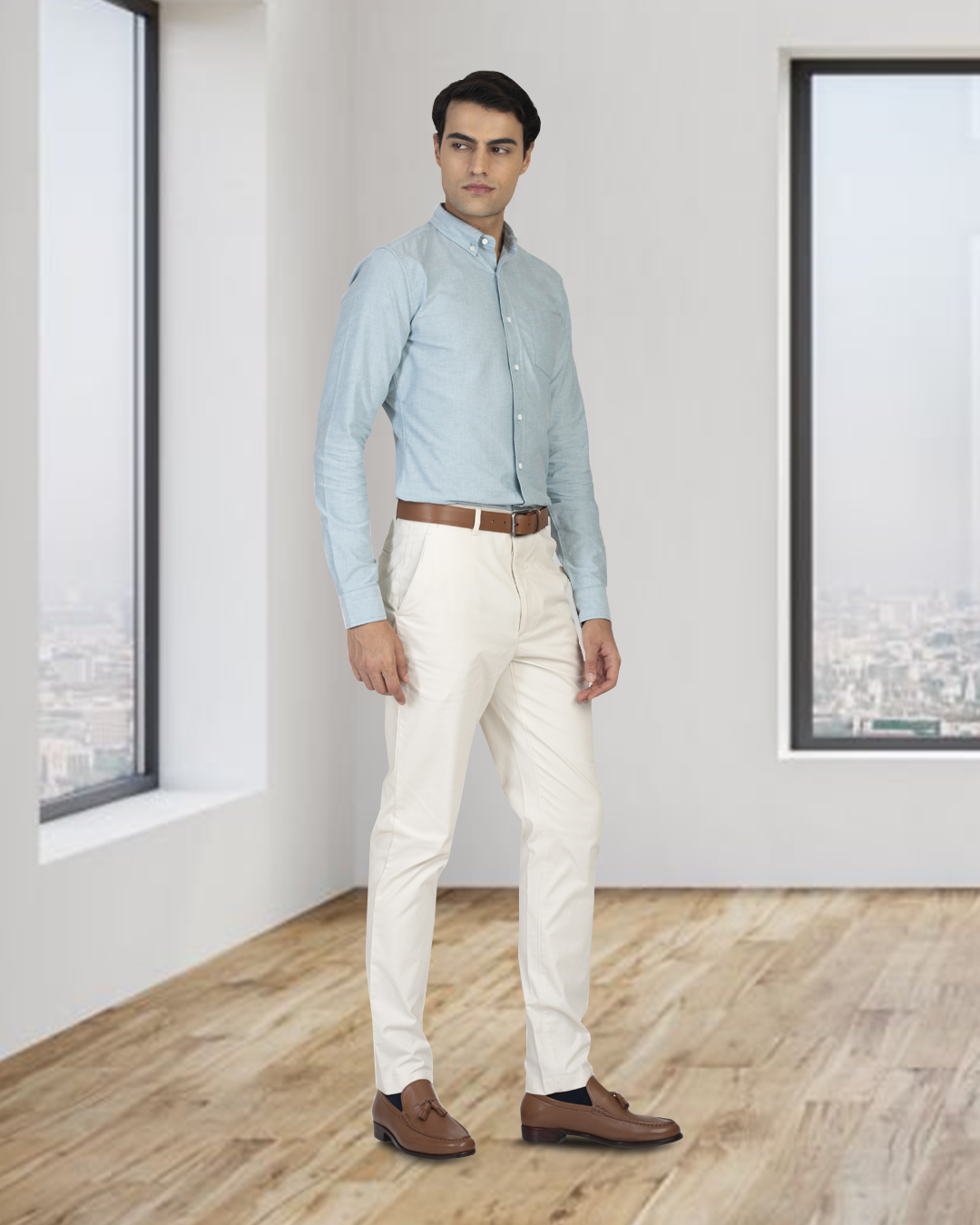 Side of model wearing the custom oxford shirt for men by Luxire in mint green