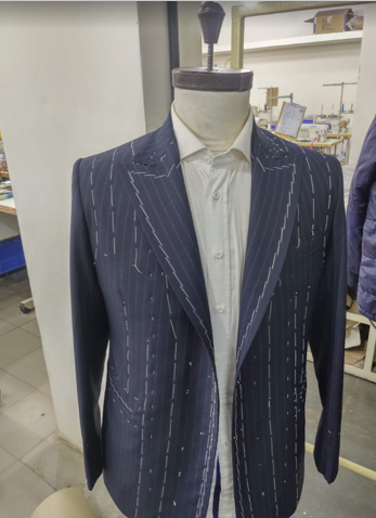 Garment being constructed at Luxire workshop
